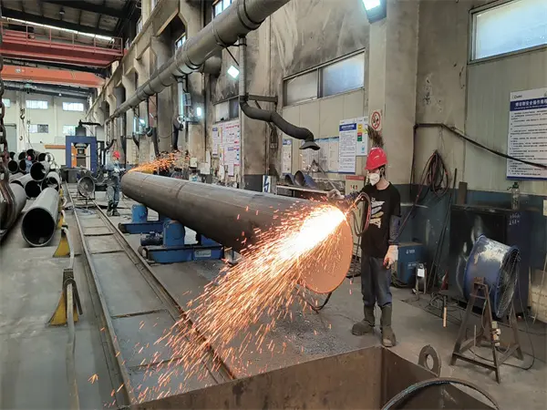 Pipe bevel end manufacture in workshop